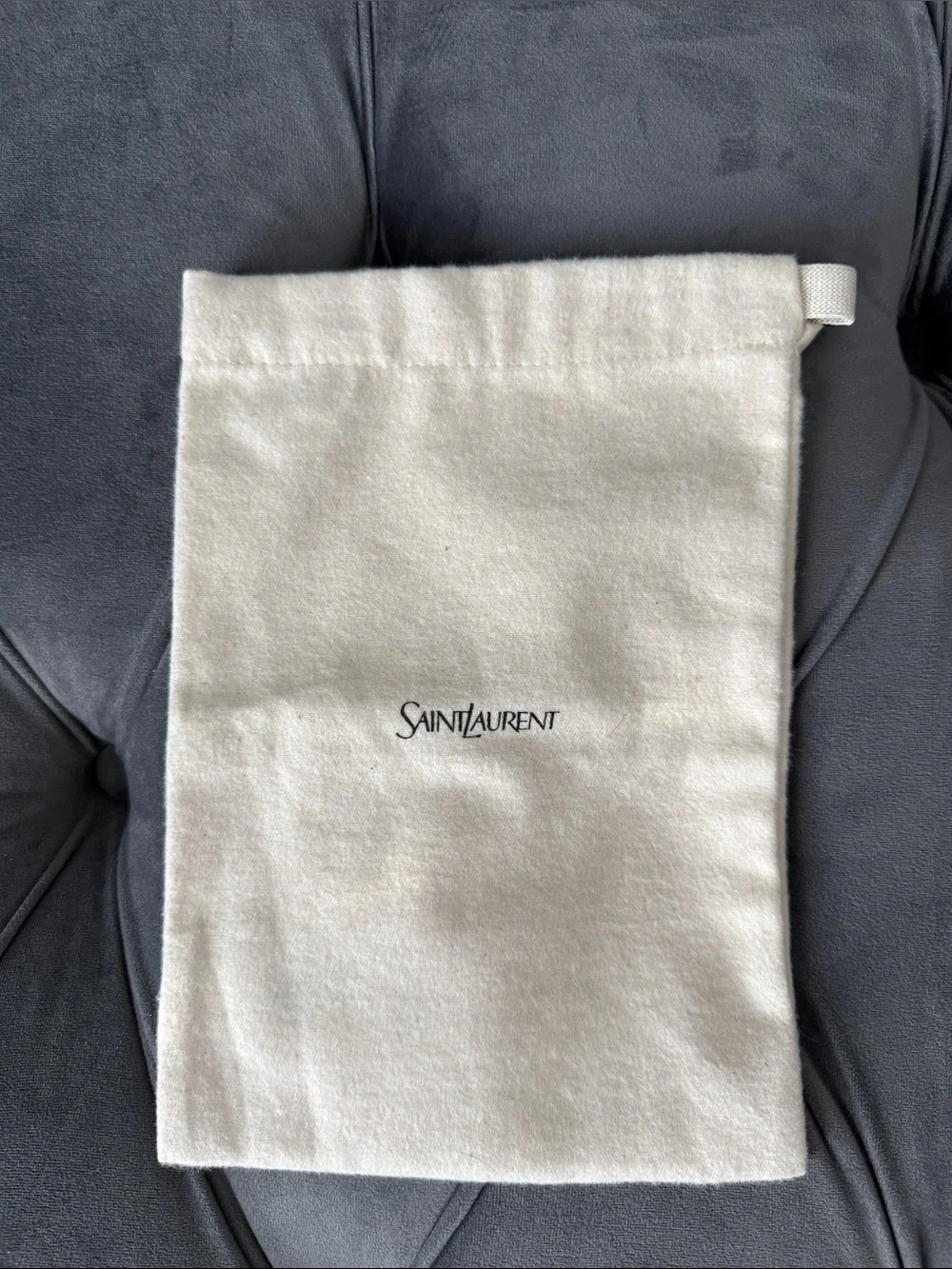 Yves Saint Laurent Cream Dust Bag with Black Logo for belt accessories
